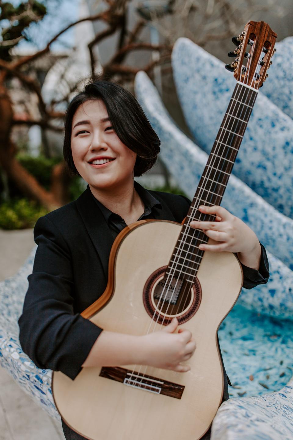 Guitarist Bokyung Byun is guest soloist for the Sarasota Orchestra Discoveries concert “Musical Postcards.”