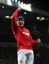 Manchester United's Wayne Rooney celebrates his teams third goal, during the UEFA Champions League Group A match at Old Trafford, Manchester.
