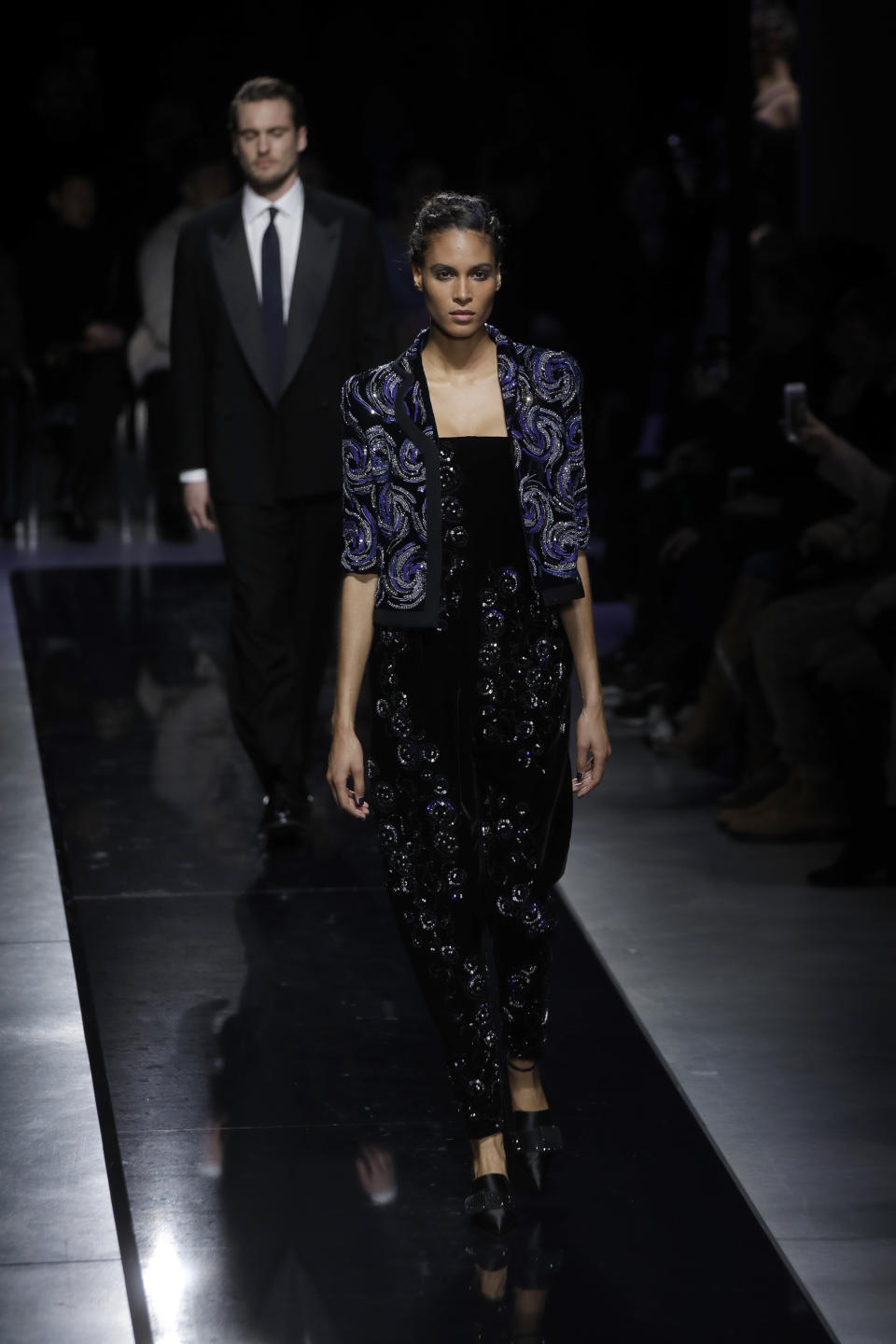 Model Cindy Bruna wears a creation as part of the Giorgio Armani women's Fall-Winter 2019-2020 collection, that was presented in Milan, Italy, Saturday, Feb. 23, 2019. (AP Photo/Luca Bruno)