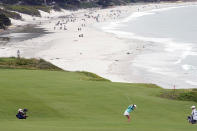 Aine Donegan, of Ireland, hits from the fairway on the ninth hole during the first round of the U.S. Women's Open golf tournament at the Pebble Beach Golf Links, Thursday, July 6, 2023, in Pebble Beach, Calif. (AP Photo/Darron Cummings)