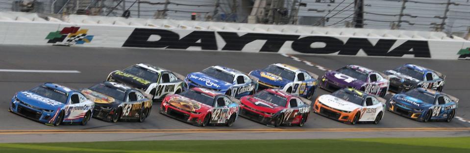 A large group of Chevrolets work the tri-oval during Cup Series practice on Friday.