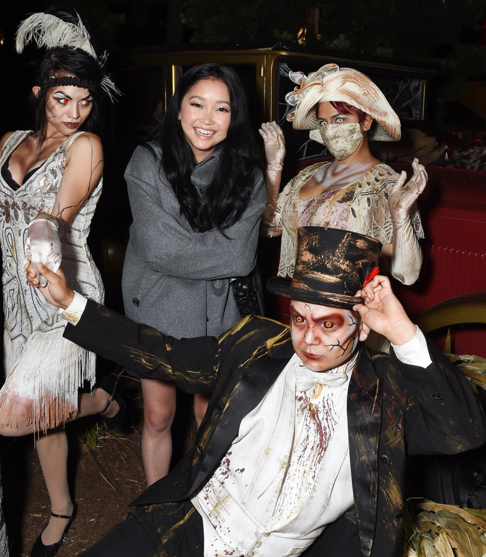 <p>smiling through the scary at Knott's Scary Farm in Buena Park, California, on Sept. 18.</p>