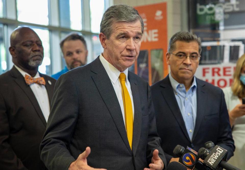 Gov. Roy Cooper pushed for higher vaccination rates throughout North Carolina at the Charlotte Transit Center in Charlotte on Wednesday.