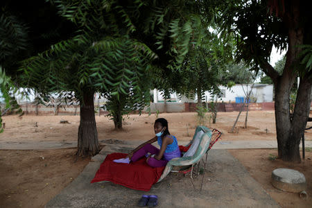 FILE PHOTO: Aidalis Guanipa, 25, a kidney disease patient, rests under a tree after a day of dialysis, at her home in La Concepcion, Venezuela April 26, 2019. REUTERS/Ueslei Marcelino