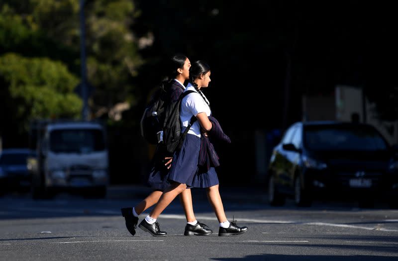 Students arrive for the first day of face-to-face schooling after a period of learning from home in Brisbane