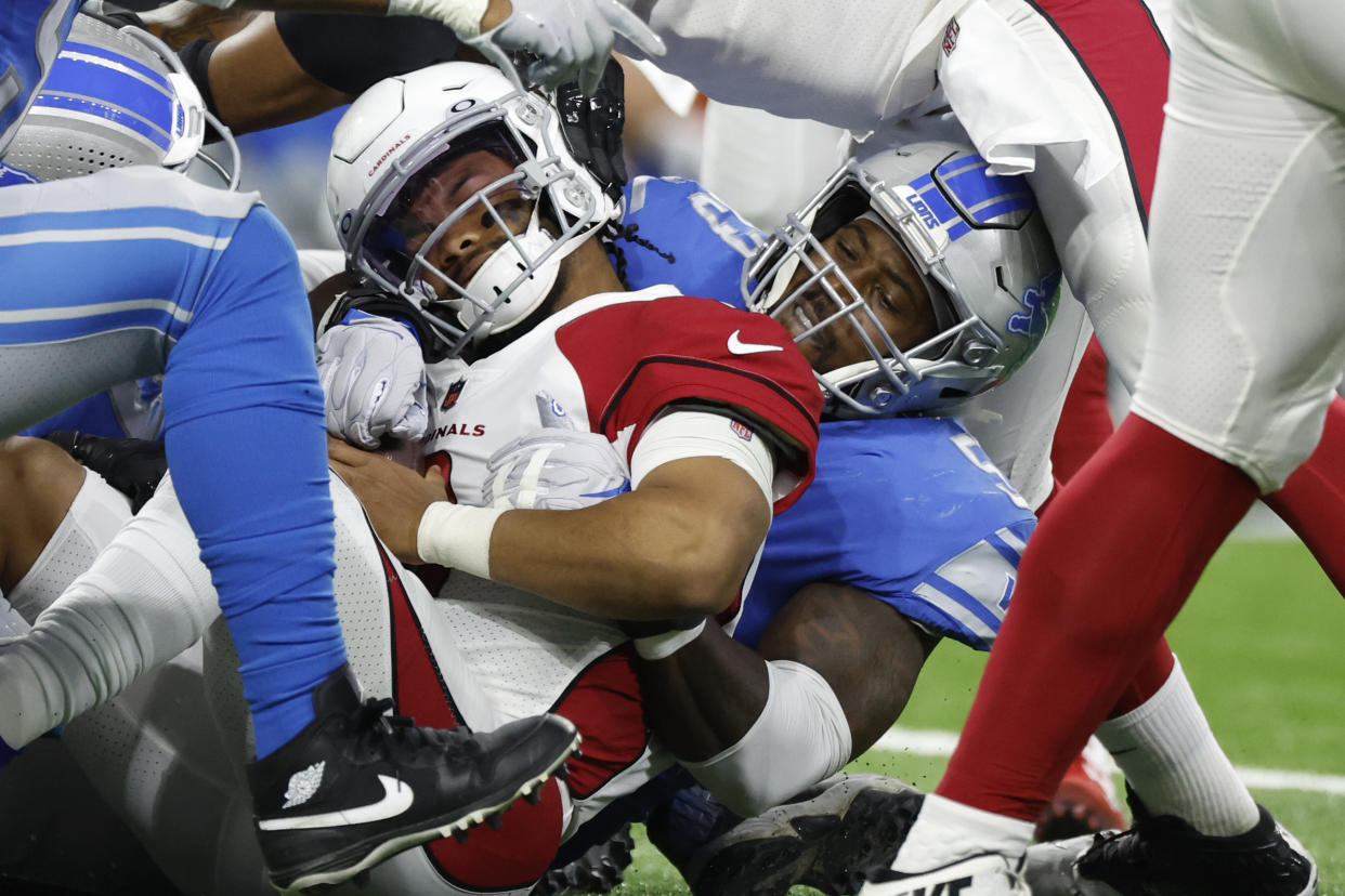 Arizona Cardinals quarterback Kyler Murray (1) is sacked by Detroit Lions outside linebacker Charles Harris (53). (AP Photo/Rick Osentoski)