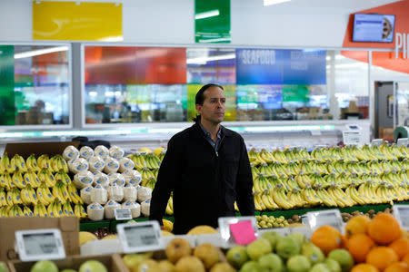 Jeff Turnas, President of 365 by Whole Foods Market, walks through a 365 by Whole Foods Market grocery store ahead of its opening day in Los Angeles, U.S., May 24, 2016. REUTERS/Mario Anzuoni