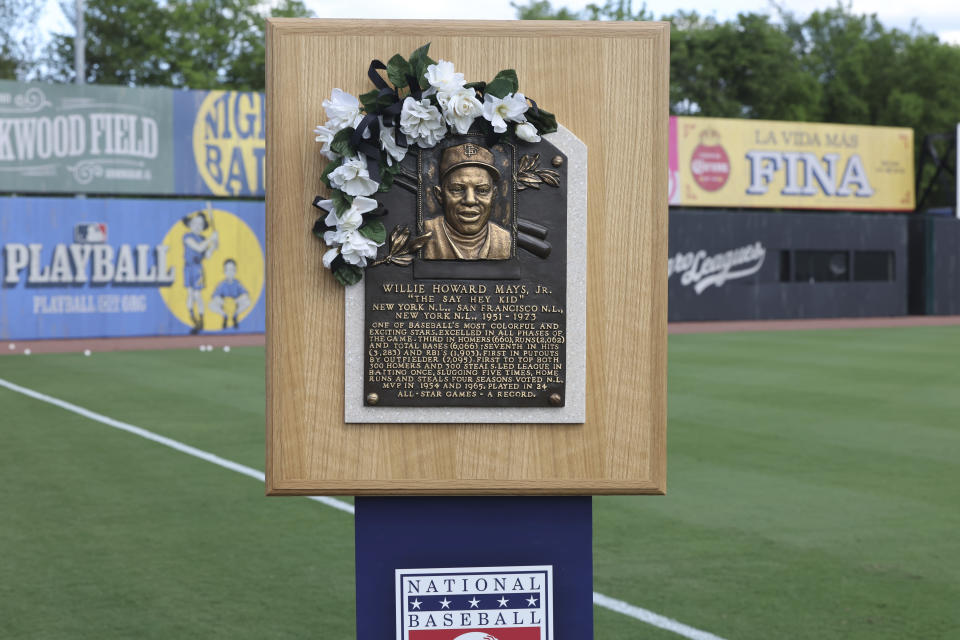 A plaque honoring Willie Mays is seen before the start of a baseball game between the St. Louis Cardinals and the San Francisco Giants at Rickwood Field, Thursday, June 20, 2024, in Birmingham, Ala. Mays, who began his professional career with the Birmingham Black Barons of the Negro Leagues in 1948 and played at Rickwood Field, passed away on Tuesday at the age of 93. (AP Photo/Vasha Hunt)