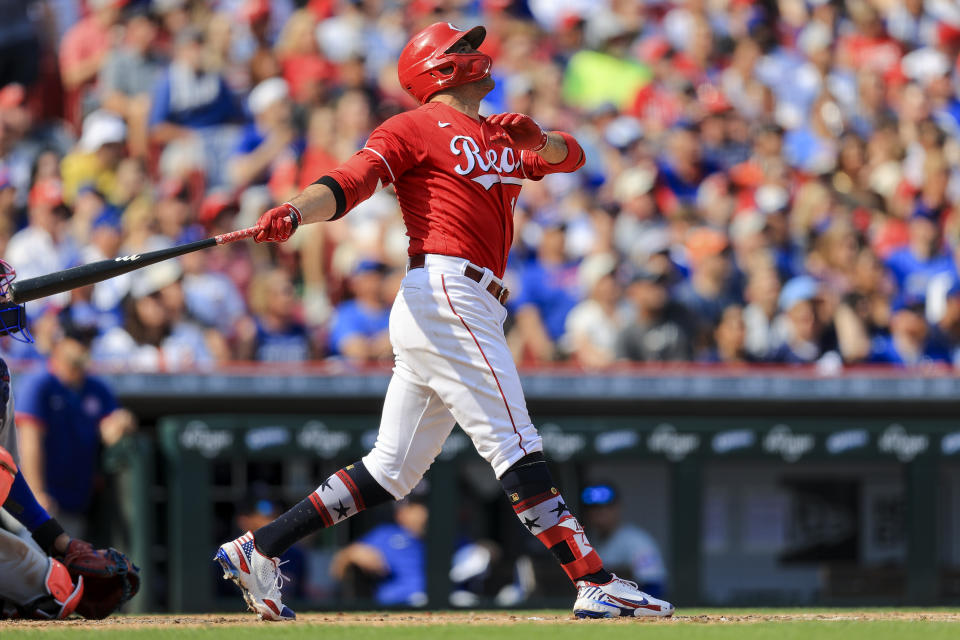 Cincinnati Reds' Joey Votto watches his solo home run during the fourth inning of a baseball game against the Chicago Cubs in Cincinnati, Saturday, July 3, 2021. (AP Photo/Aaron Doster)