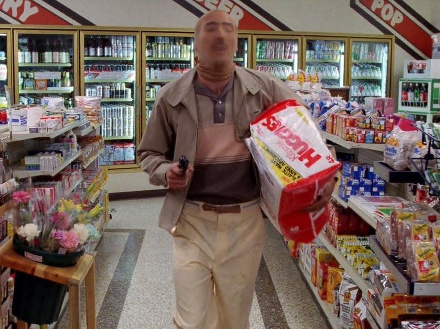H.I., played by Nicolas Cage, holds up a grocery store for Huggies diapers in "Raising Arizona."