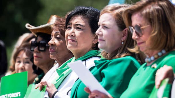 PHOTO: Rep. Judy Chu is flanked by (from right) Speaker of the House Nancy Pelosi, Reps. Lizzie Fletcher, Maxine Waters, and Frederica Wilson, as they attend a rally on the steps of the U.S. Capitol, July 15, 2022. (Tom Williams/CQ-Roll Call, Inc via Getty Imag)