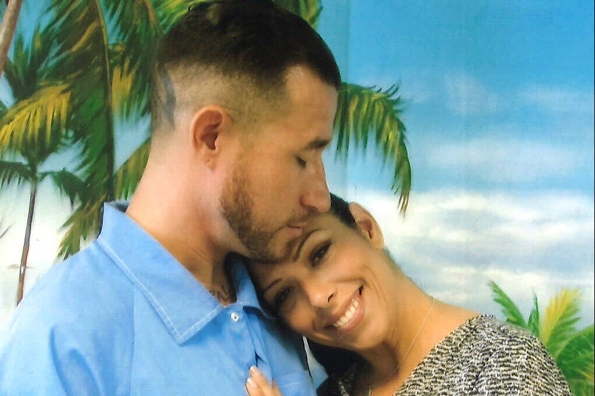 Christina Cardenas photographed with her husband, Carlos Eugene Cardenas, on an unknown date (Allred, Maroko & Goldberg via AP)