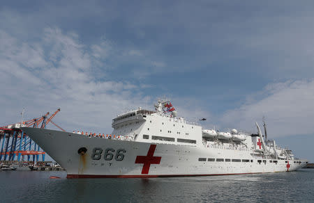 China's People's Liberation Army (PLA) Navy hospital ship Peace Ark, prepares to dock at the port in La Guaira, Venezuela September 22, 2018. REUTERS/Manaure Quintero