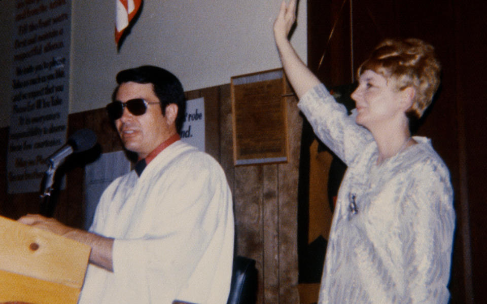 Jim Jones preaching at a pulpit. Source: Getty Images