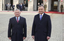 Poland's President Andrzej Duda ,right, welcomes King Abdullah II of Jordan,left, on a one-day visit in a ceremony before the Presidential Palace in Warsaw, Poland, on Tuesday, Oct. 26, 2021. Later, Duda and King Abdullah II of Jordan held talks focused on security and cooperation in the defense sector. (AP Photo/Czarek Sokolowski)