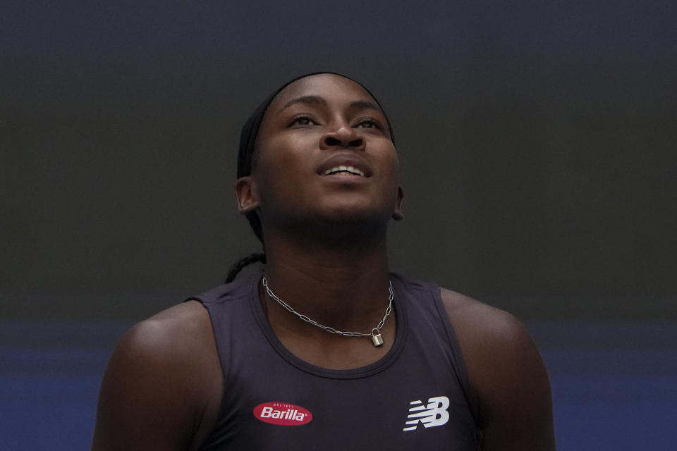 Coco Gauff of the United States reacts after losing a point to Iga Swiatek of Poland during the women's singles semifinal match in the China Open tennis tournament at the Diamond Court in Beijing, Saturday, Oct. 7, 2023. (AP Photo/Andy Wong)