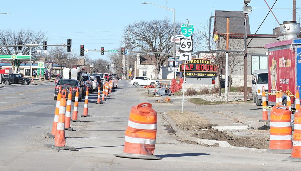 Lanes closed due to the construction of sanitary sewer on Duff Ave on Monday, Dec. 18, 2023, in Ames, Iowa.