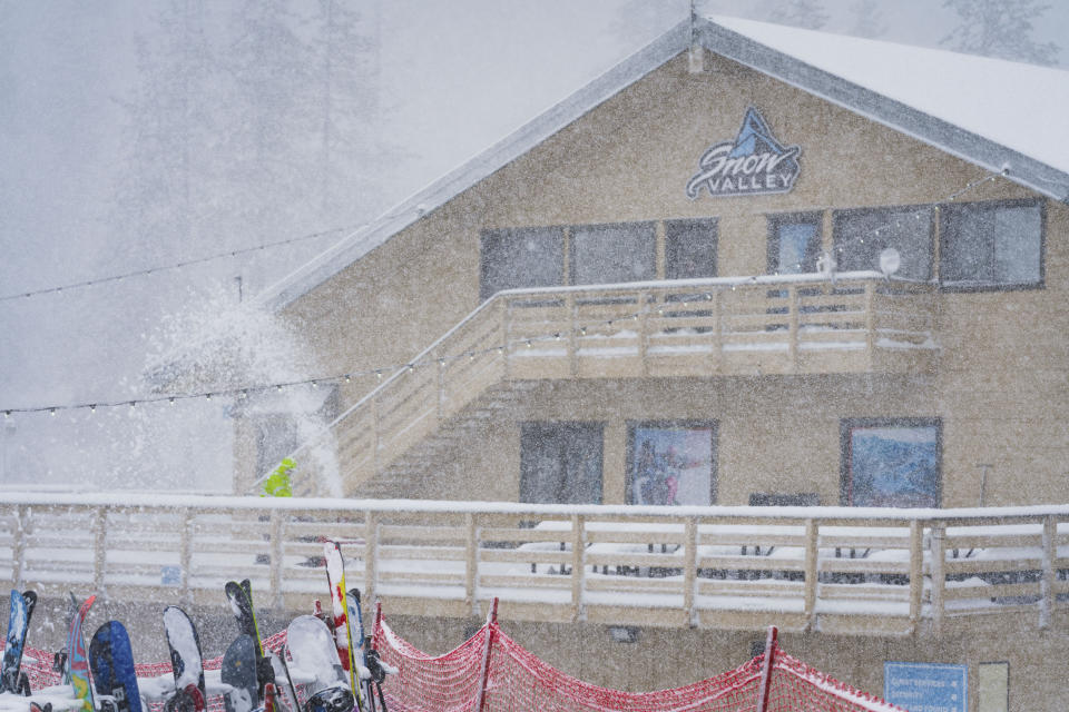 Snow falls on the Big Mountain Resort property during a storm, Saturday, March 30, 2024, in Big Bear Lake, Calif. (Big Mountain Resort via AP)