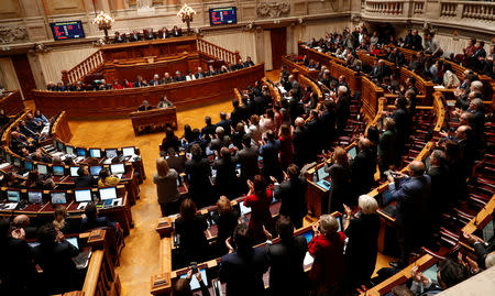 Members of left parties applaud after they voted to approve the 2019 state budget at the parliament in Lisbon, Portugal November 29, 2018. REUTERS/Rafael Marchante