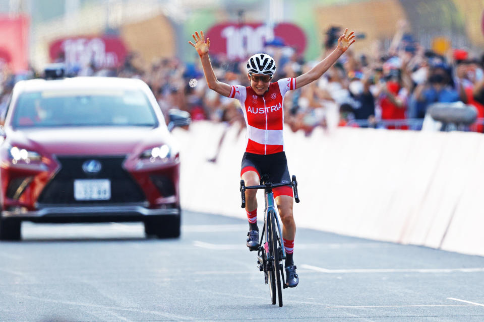 OYAMA, JAPAN - JULY 25: Anna Kiesenhofer of Team Austria celebrates winning the gold medal on day two of the Tokyo 2020 Olympic Games at Fuji International Speedway on July 25, 2021 in Oyama, Shizuoka, Japan. (Photo by Tim de Waele/Getty Images)