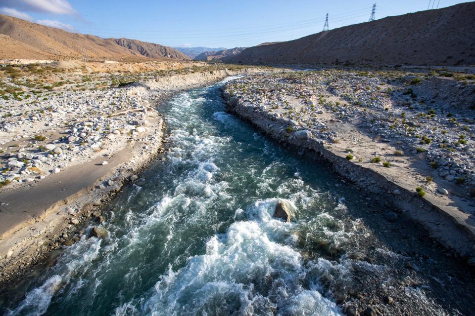 Water is flowing much faster than normal in the Whitewater River channel as it makes its way to the groundwater recharge facility in Whitewater, Calif., on Wed., May 10, 2023. For the first time since 2006, Coachella Valley Water District and Desert Water Agency are receiving their full allocation of water from the State Water Project.