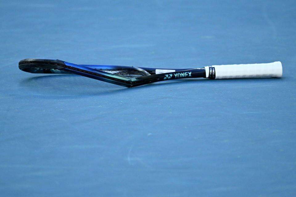 MELBOURNE, AUSTRALIA - JANUARY 25: The broken racquet of Denis Shapovalov of Canada is seen after losing his Men&#39;s Singles Quarterfinals match against Rafael Nadal of Spain during day nine of the 2022 Australian Open at Melbourne Park on January 25, 2022 in Melbourne, Australia. (Photo by Quinn Rooney/Getty Images)