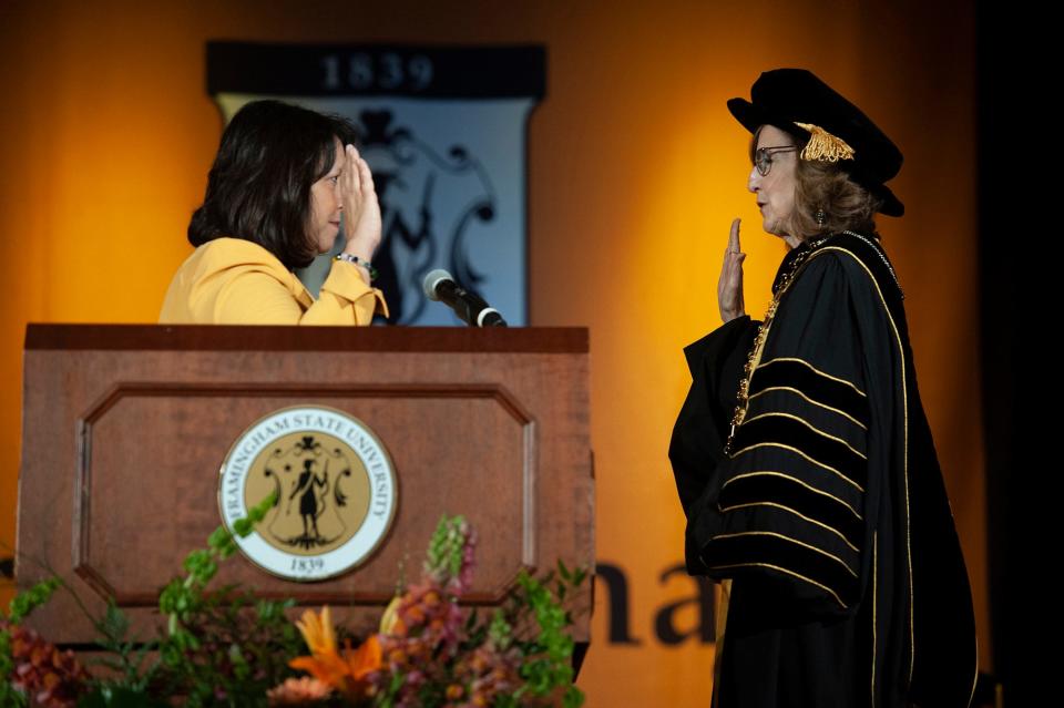 Nancy Niemi, right, is sworn in by Lt. Gov. Kim Driscoll as the 17th president of Framingham State University, May 5, 2023.