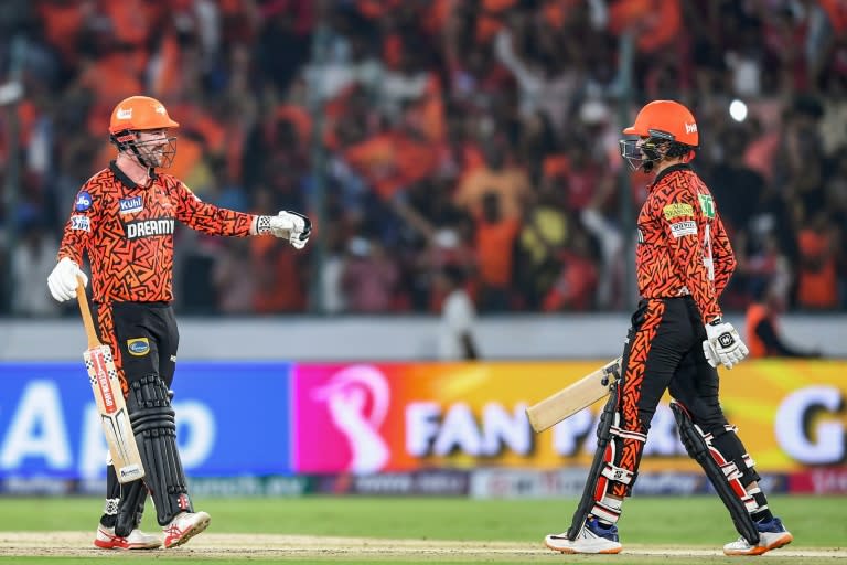 Destroyers: Sunrisers Hyderabad's Travis Head (L) and Abhishek Sharma celebrate their win (Noah SEELAM)