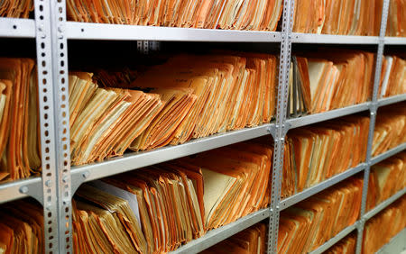 A shelf containing documents of the former East German Ministry for State Security (MfS), known as the Stasi, is pictured at the central archives office in Berlin, Germany, March 12, 2019. Picture taken March 12, 2019. REUTERS/Fabrizio Bensch