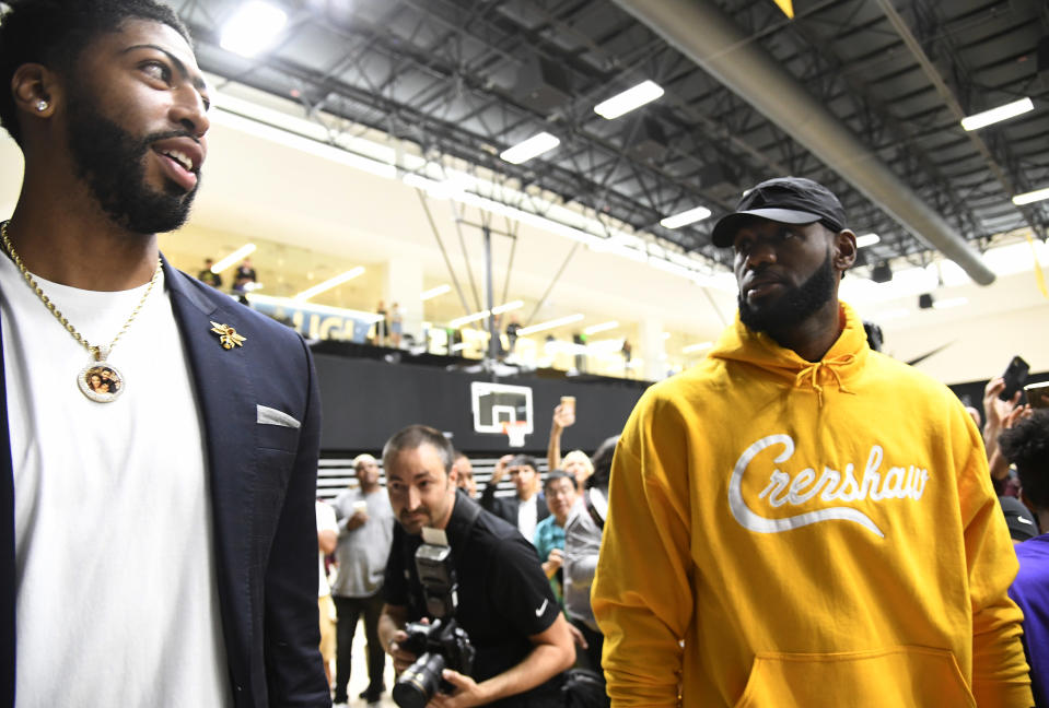 EL SEGUNDO, CA - JULY 13: LeBron James (R) talks with Anthony Davis after during a press conference where Davis was introduced as the newest player of the Los Angeles Lakers at UCLA Health Training Center on July 13, 2019 in El Segundo, California. NOTE TO USER: User expressly acknowledges and agrees that, by downloading and/or using this Photograph, user is consenting to the terms and conditions of the Getty Images License Agreement. (Photo by Kevork Djansezian/Getty Images)