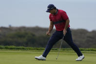 Patrick Reed reacts after making his putt for par on the 14th hole on the South Course during the final round of the Farmers Insurance Open golf tournament at Torrey Pines, Sunday, Jan. 31, 2021, in San Diego. (AP Photo/Gregory Bull)