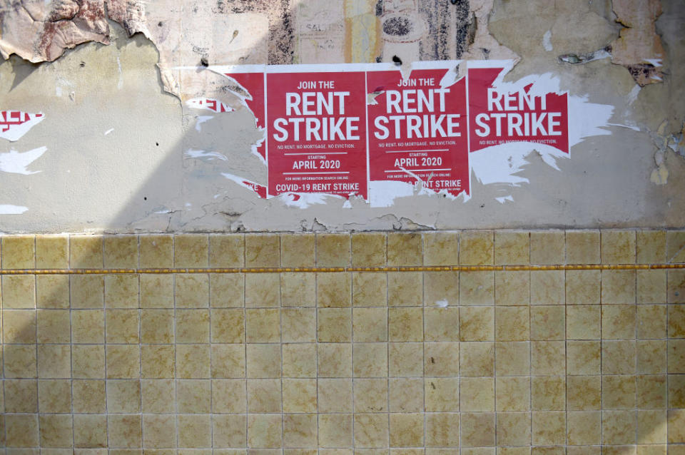 Posters advertising a strike in support of renters are seen on the side of a store in Melbourne, Australia, on Tuesday, Sept. 1, 2020. (Photographer: Carla Gottgens/Bloomberg)