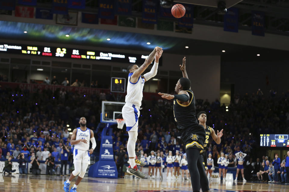 Tulsa guard Elijah Joiner (3) hits the game winning three pointer against Wichita State in the second half of Tulsa's 54-51 win over Wichita State in an NCAA college basketball game in Tulsa, Okla., Saturday, Feb. 1, 2020. (AP Photo/Joey Johnson)