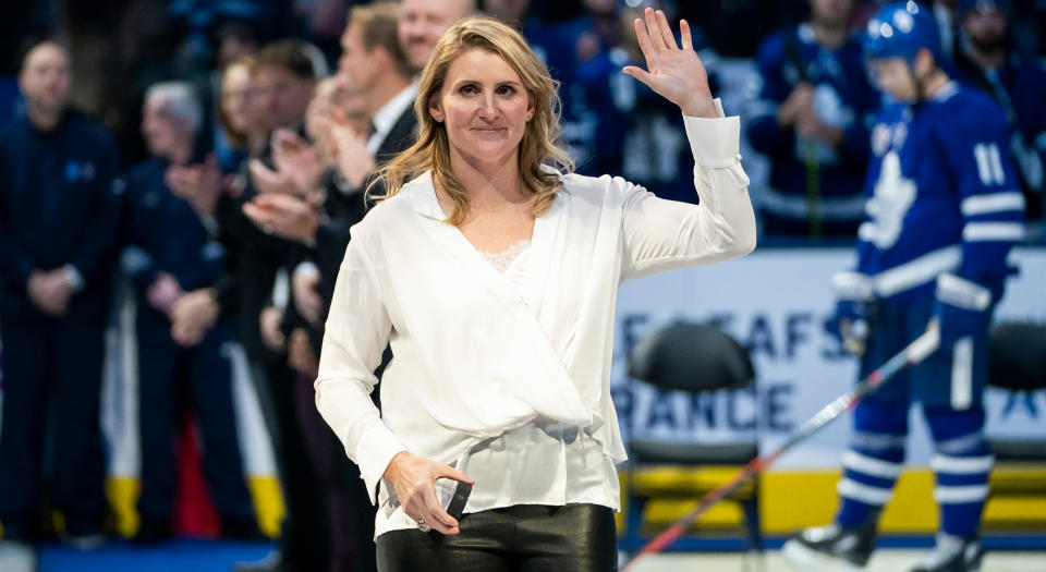 TORONTO, ON - NOVEMBER 15: 2019 Hockey Hall of Fame inductee Hayley Wickenheiser waves to the crowd during a pre-game ceremony at the Scotiabank Arena on November 15, 2019 in Toronto, Ontario, Canada. The Toronto Maple Leafs face the Boston Bruins. (Photo by Mark Blinch/NHLI via Getty Images)