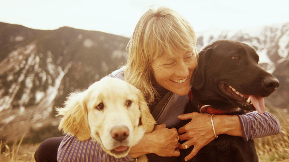 woman with two dogs