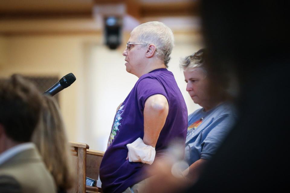 Ellen Goldsmith, of Marlborough, speaks about her positive experiences during her treatment at MetroWest Medical Center during the state Department of Public Health public hearing at Nevins Hall in Framingham, July 6, 2022.