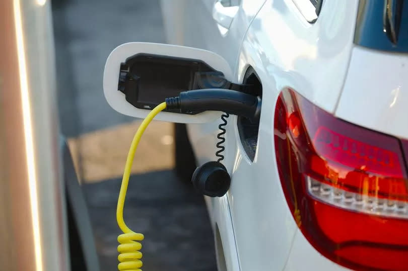 Electric car at a charging station