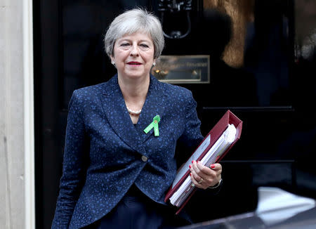 FILE PHOTO: Britain's Prime Minister Theresa May leaves Downing Street in London, Britain, October 10, 2018. REUTERS/Simon Dawson/File Photo