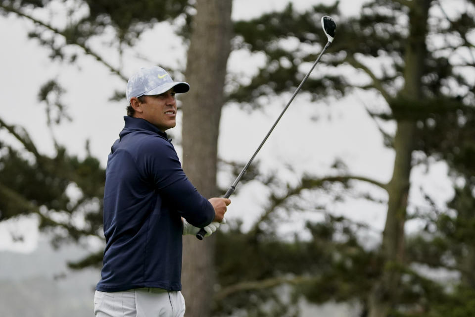 Brooks Koepka watches his tee shot on the 15th hole during the first round of the PGA Championship golf tournament at TPC Harding Park Thursday, Aug. 6, 2020, in San Francisco. (AP Photo/Charlie Riedel)