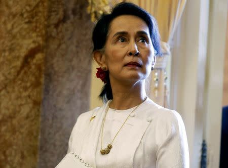 FILE PHOTO: Myanmar's State Counsellor Aung San Suu Kyi is seen while she waits for a meeting with Vietnam's President Tran Dai Quang (not pictured) at the Presidential Palace during the World Economic Forum on ASEAN in Hanoi, Vietnam September 13, 2018. REUTERS/Kham/Pool/File Photo