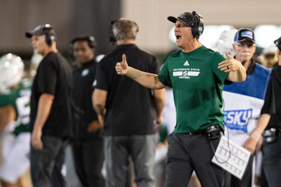 Sacramento State football head coach Andy Thompson shouts to his team from the sideline during the first half of the NCAA football game at Hornet Stadium on Saturday.