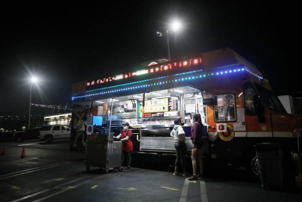 A taco truck at night