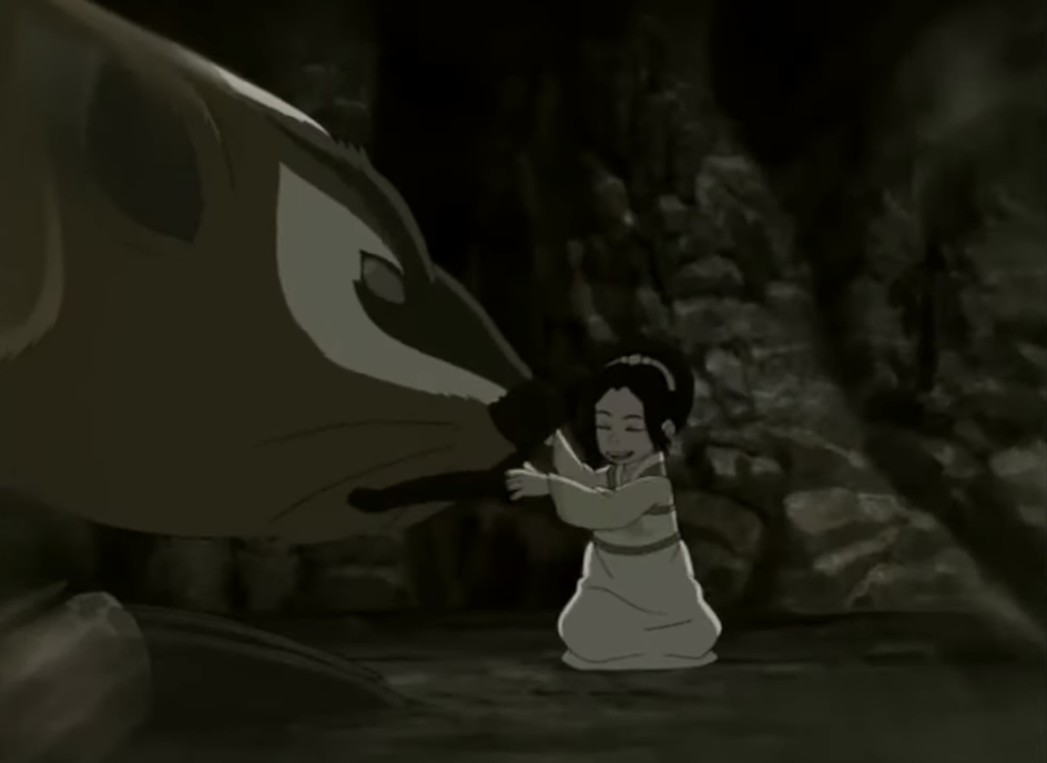 Baby Toph playing with a badgermole