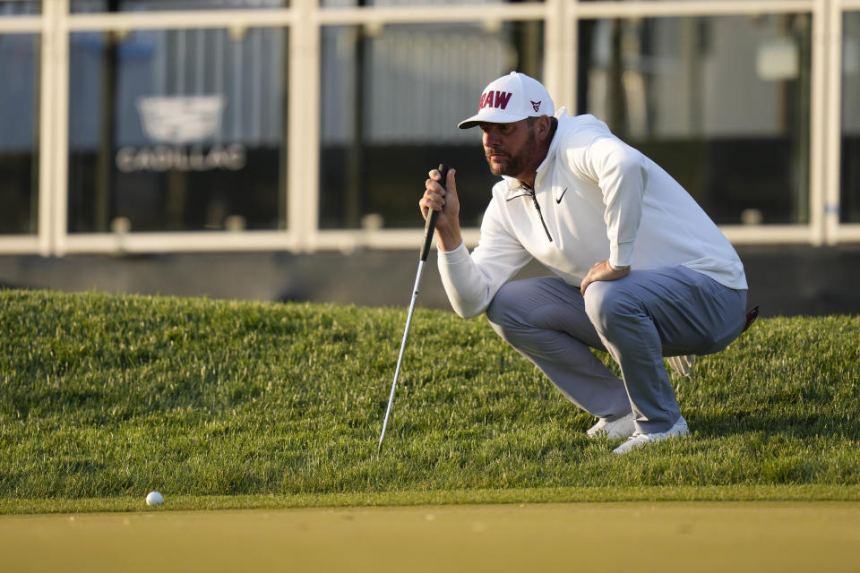 Michael Block lines up a putt on the 18th hole during the first round of the PGA Championship golf tournament at Oak Hill Country Club on Thursday, May 18, 2023, in Pittsford, N.Y. (AP Photo/Seth Wenig)