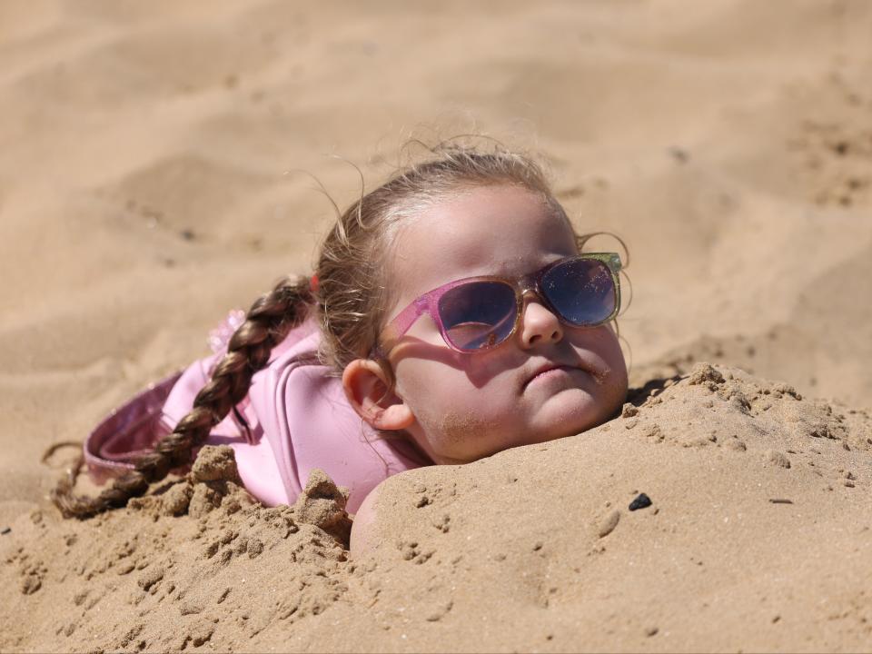 Families went to the beach to bask in the sunshine on Saturday (Getty Images)