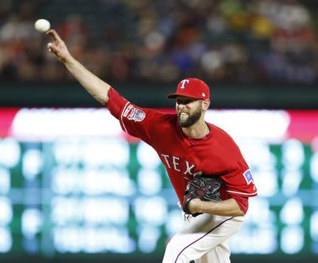 Apr 20, 2019; Arlington, TX, USA; Texas Rangers relief pitcher Chris Martin (31) delivers a pitch to the Houston Astros during the ninth inning of a baseball game at Globe Life Park in Arlington. The Rangers won 9-4. Mandatory Credit: Jim Cowsert-USA TODAY Sports