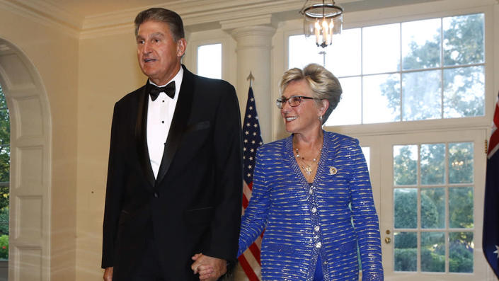 FILE: Sen. Joe Manchin, D-W.Va., left, and wife Gayle Conelly Manchin arrive for a State Dinner with Australian Prime Minister Scott Morrison and President Donald Trump at the White House, Friday, Sept. 20, 2019, in Washington.&nbsp; / Credit: AP Photo/Patrick Semansky