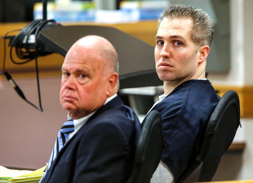 Jeff George (right) sits in court with his attorney David Roth in 2013 during his sentencing in the death of Joseph "Joey" Bartolucci on charges related to his operation of a pain clinic.