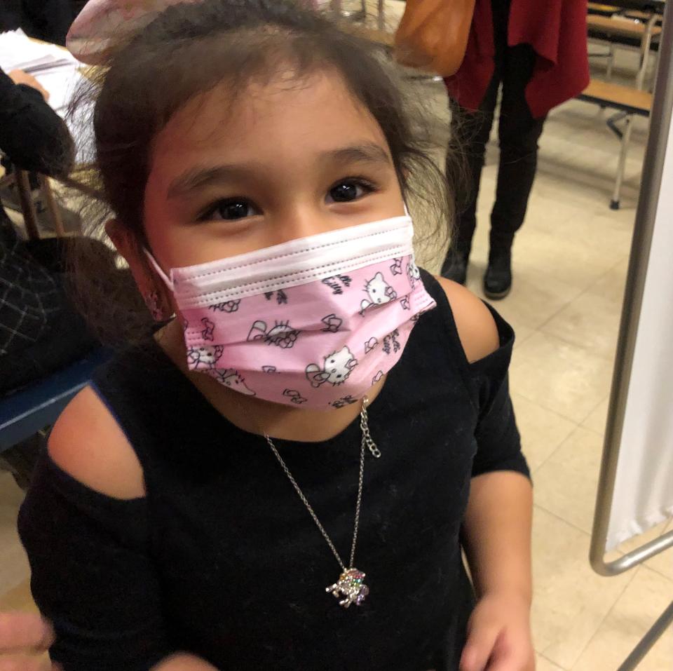 Camila Escovedo, 5, received her first COVID vaccination dose at Kakiat school on Tuesday, Dec. 7, 2021.