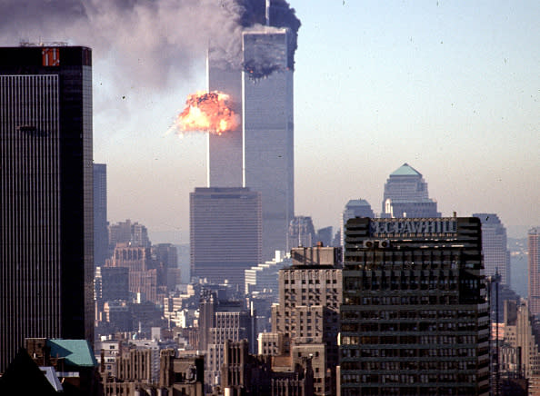 A hijacked commercial plane crashes into the World Trade Center 11 September 2001 in New York. The landmark skyscrapers were destroyed in the attack. 